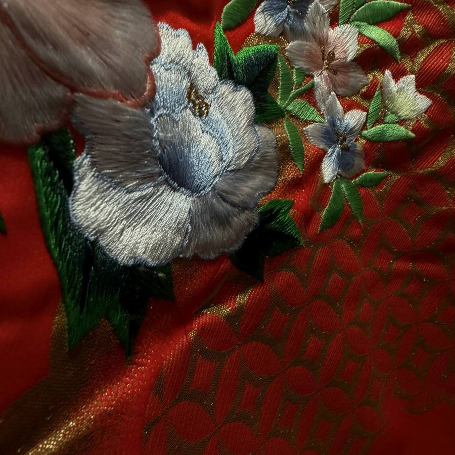 Embroidered blue peony on red silk